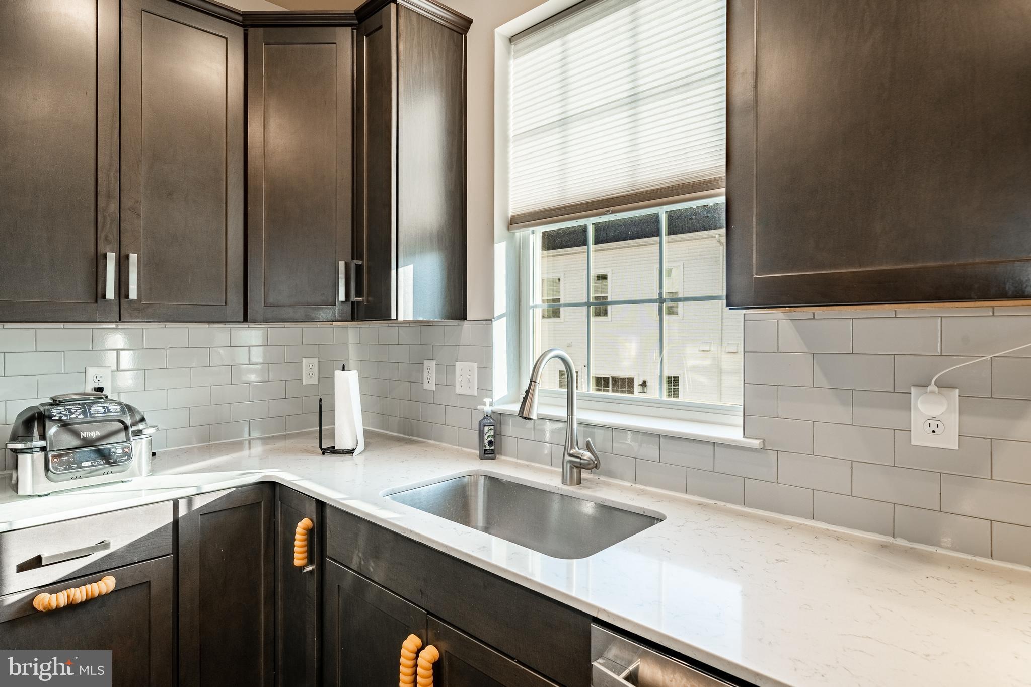 228 Red Leaf Lane Exton, PA 19341 - Photo 8 of 26 a kitchen with a sink and cabinets
