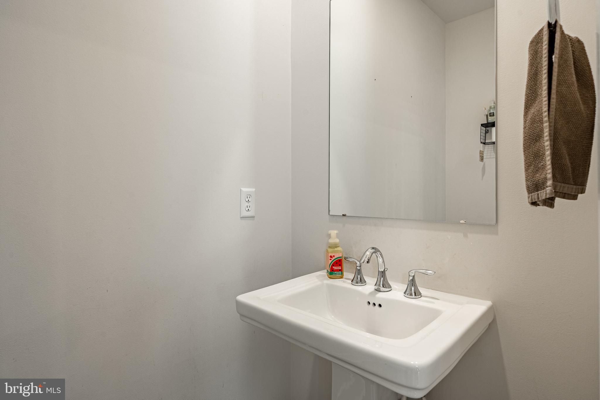 228 Red Leaf Lane Exton, PA 19341 - Photo 9 of 26 a bathroom with a sink and a mirror