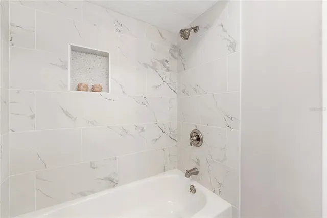 a bathroom with a bathtub