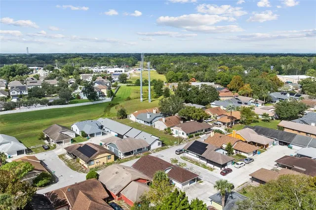 an aerial view of a house with a garden