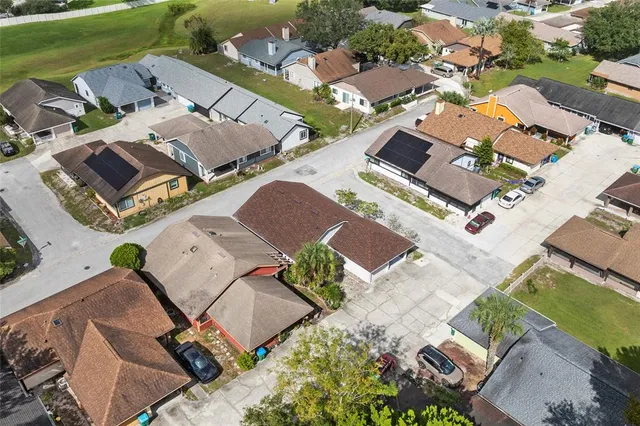 an aerial view of a house with a garden