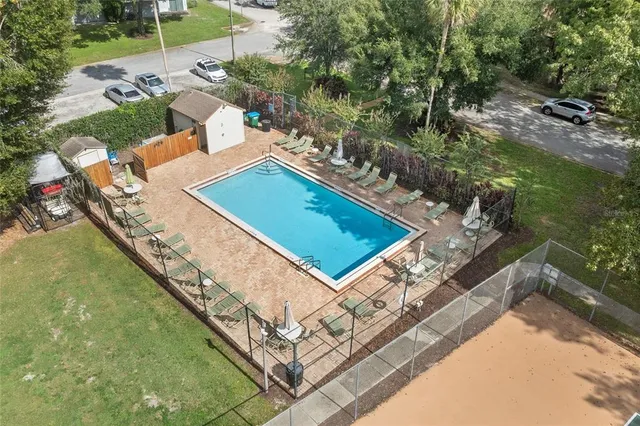 a view of a backyard with chairs