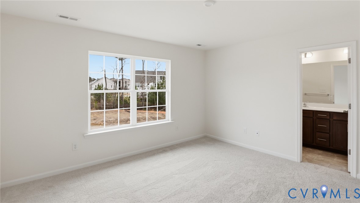 6531 Topsail Point Richmond, VA 23234 - Photo 17 of 35 Upstairs, you'll find the first primary suite, fe