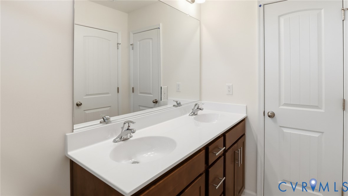 6531 Topsail Point Richmond, VA 23234 - Photo 18 of 35 Upstairs, you'll find the first primary suite, fe