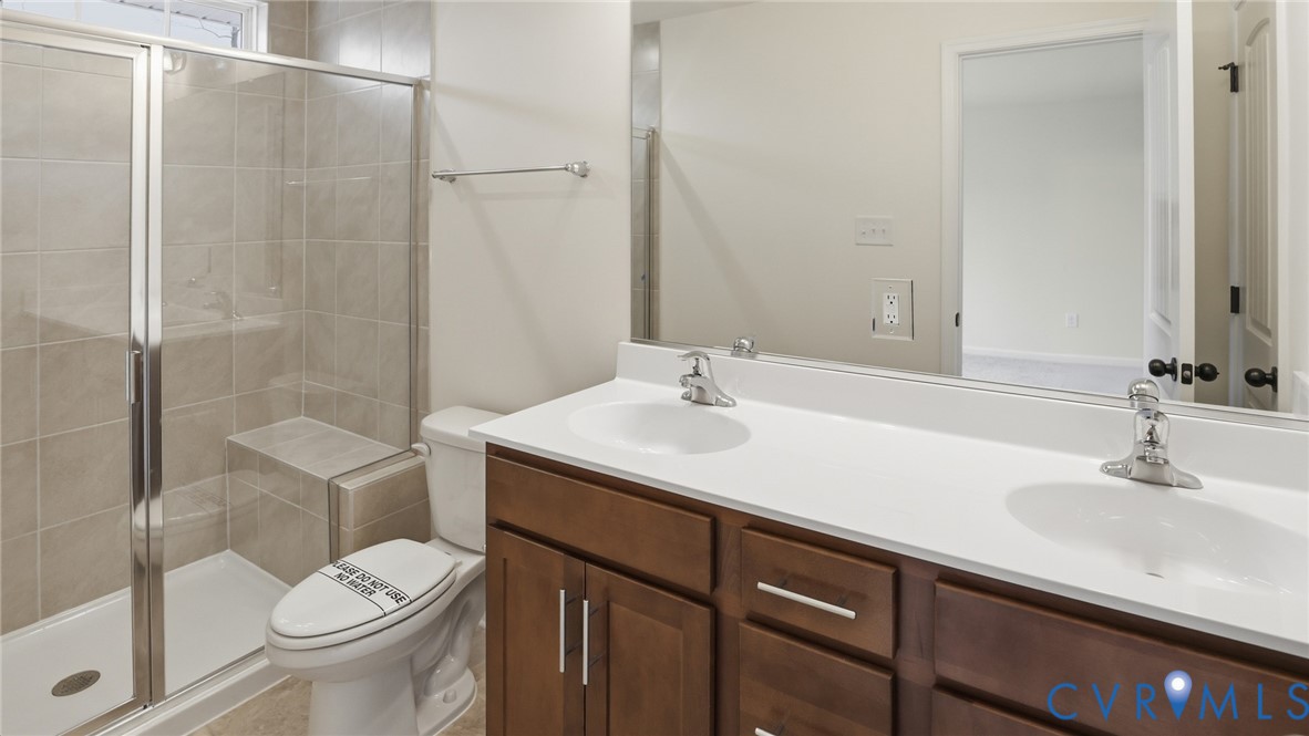 6531 Topsail Point Richmond, VA 23234 - Photo 20 of 35 Upstairs, you'll find the first primary suite, fe