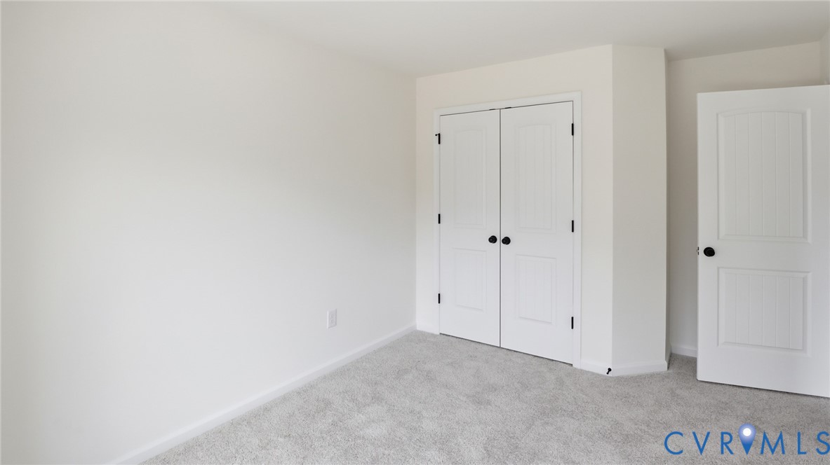 6531 Topsail Point Richmond, VA 23234 - Photo 23 of 35 Two additional bedrooms share a convenient hall ba