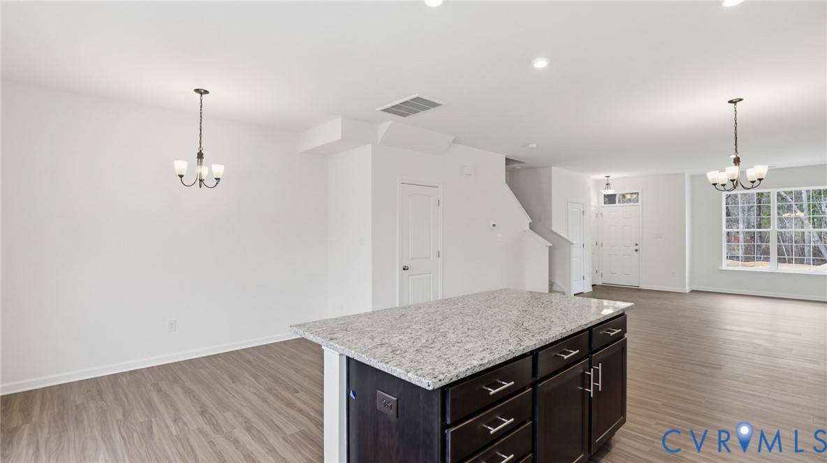 6531 Topsail Point Richmond, VA 23234 - Photo 6 of 35 The gourmet kitchen includes crisp white cabinets,