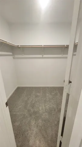 a bathroom with a double vanity sink and mirror