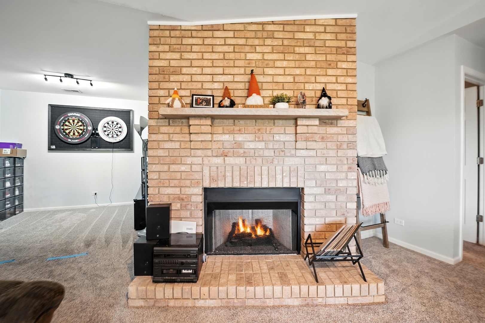 10228 SW Highway, Unit 3C Chicago Ridge, IL 60415 - Photo 7 of 17 a living room with furniture and a fireplace