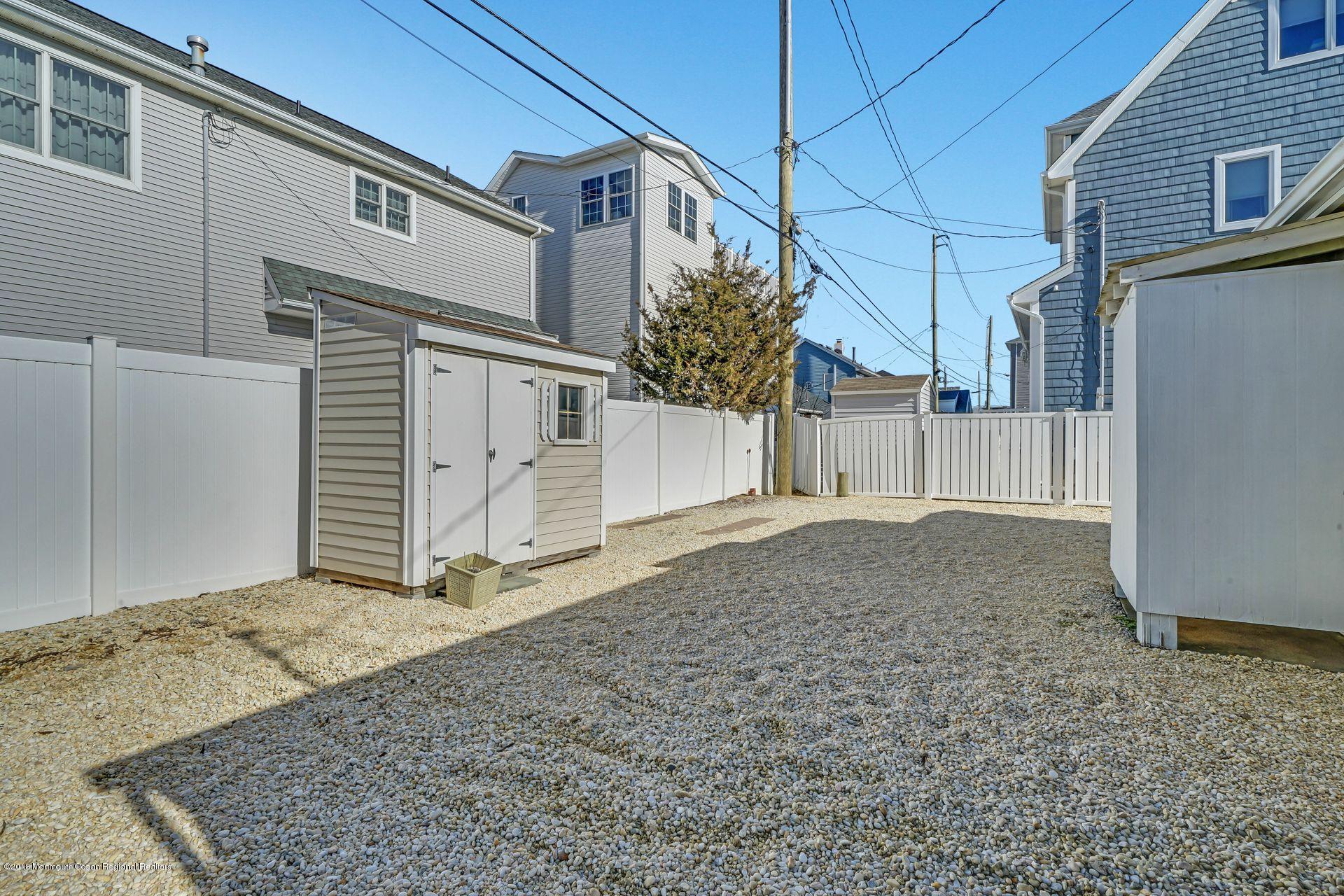 124 South Bayside Road Lavallette, NJ 08735 - Photo 20 of 26 a view of a house with a yard