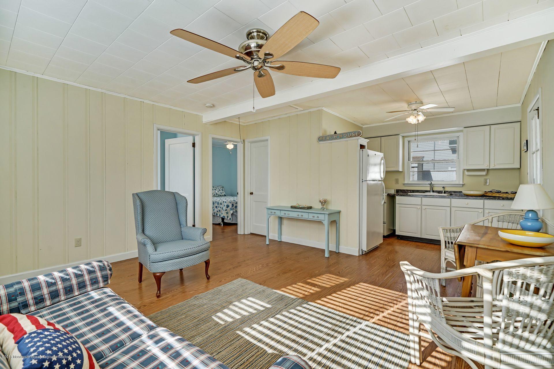 124 South Bayside Road Lavallette, NJ 08735 - Photo 4 of 26 a living room with furniture and a view of kitchen