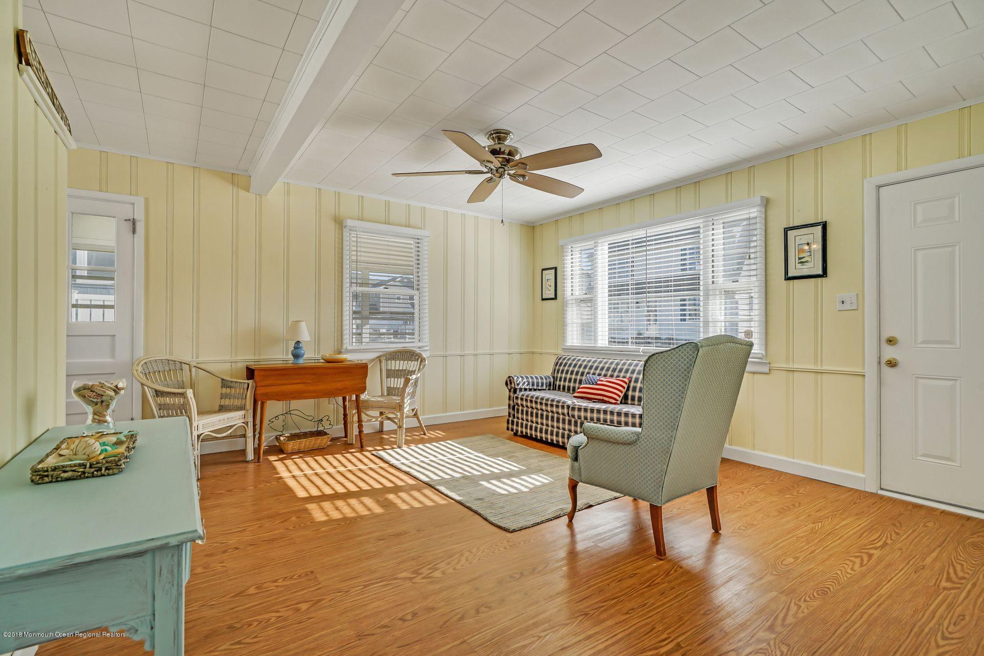 124 South Bayside Road Lavallette, NJ 08735 - Photo 6 of 26 a living room with furniture and a window