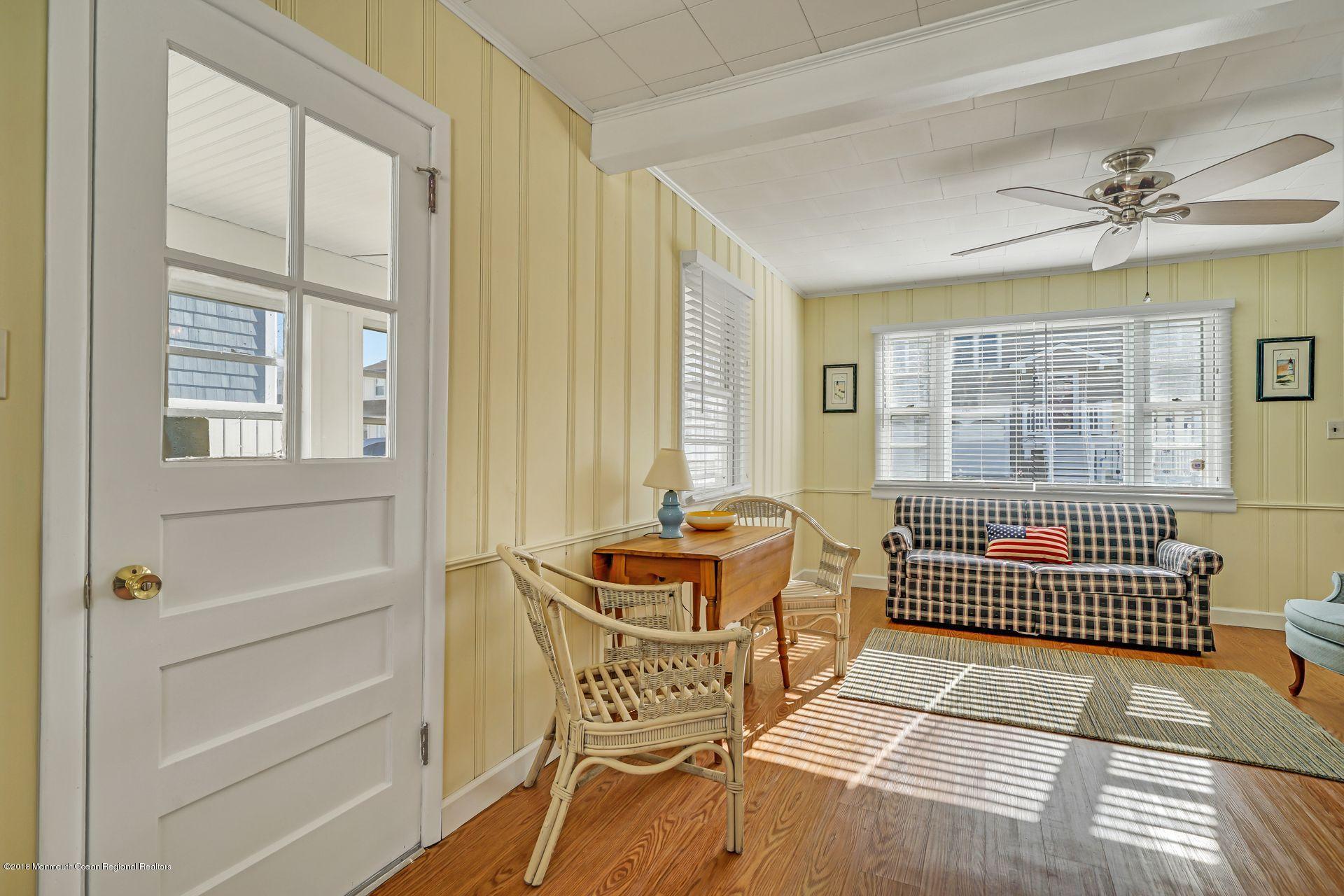 124 South Bayside Road Lavallette, NJ 08735 - Photo 9 of 26 a living room with furniture and windows