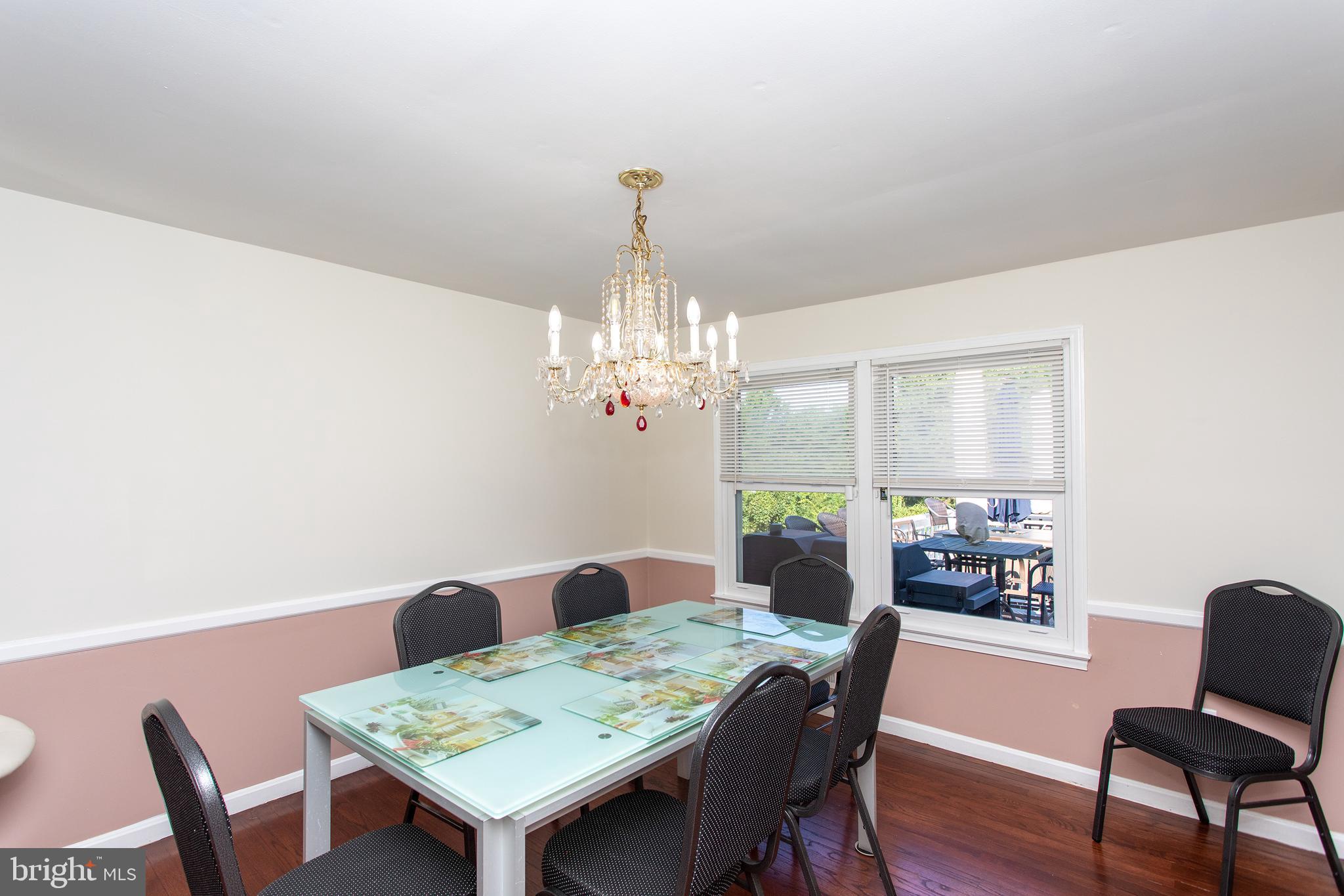 529 Rosier Road Fort Washington, MD 20744 - Photo 14 of 63 Formal dining room with window overlooking deck
