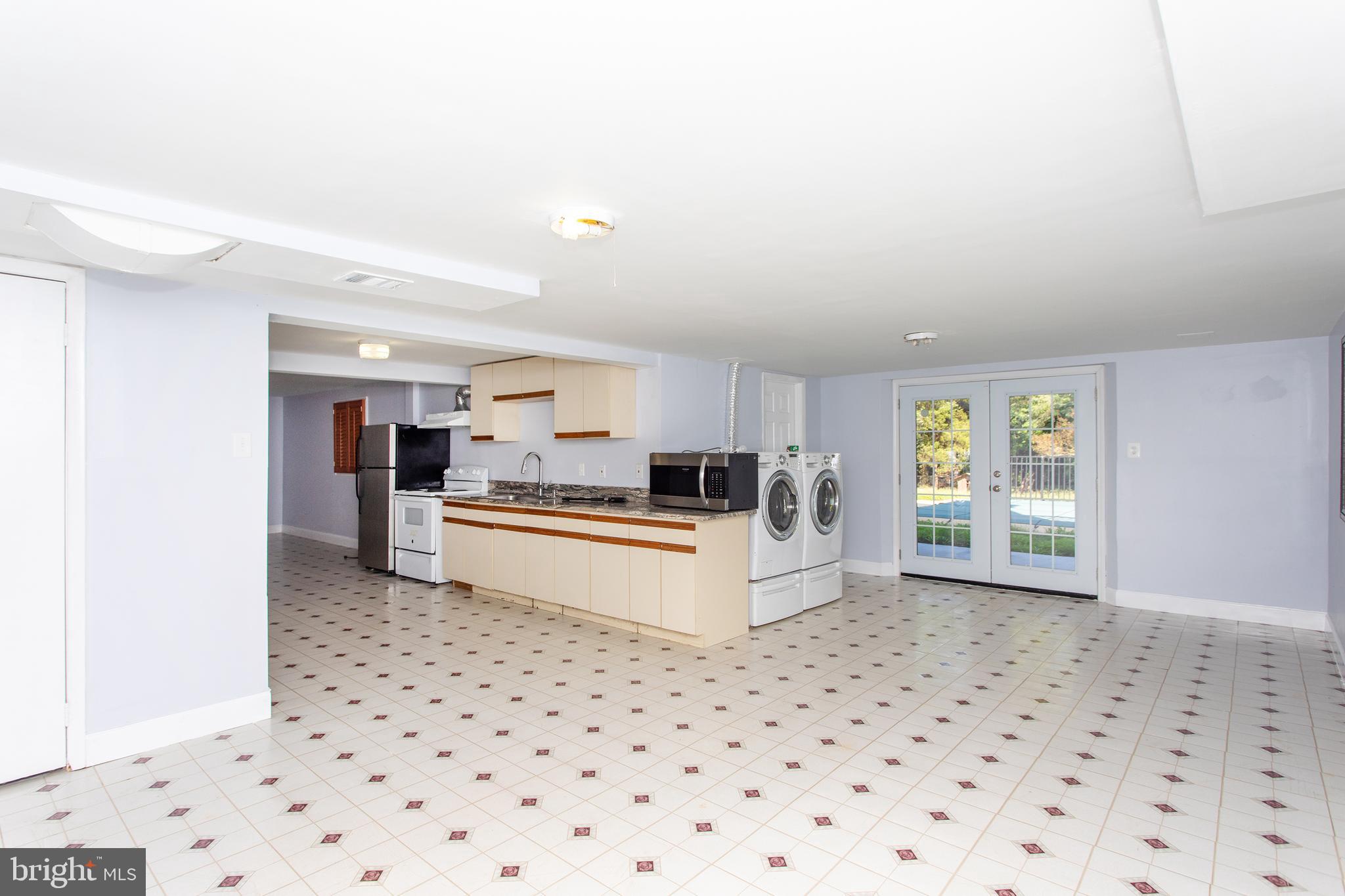 529 Rosier Road Fort Washington, MD 20744 - Photo 40 of 63 Basement with kitchen, W&D and separate entrance