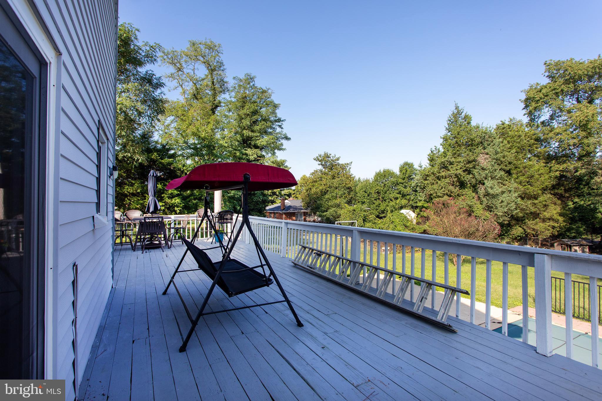 529 Rosier Road Fort Washington, MD 20744 - Photo 45 of 63 Large deck with views of the backyard and NH