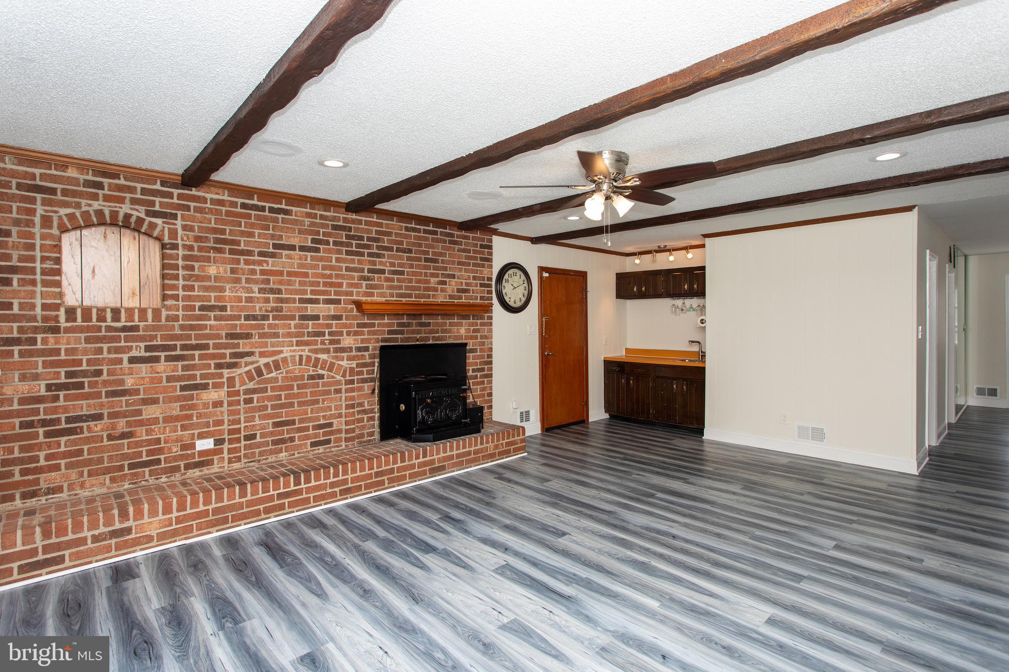 529 Rosier Road Fort Washington, MD 20744 - Photo 6 of 63 Family room with door to garage and mini bar