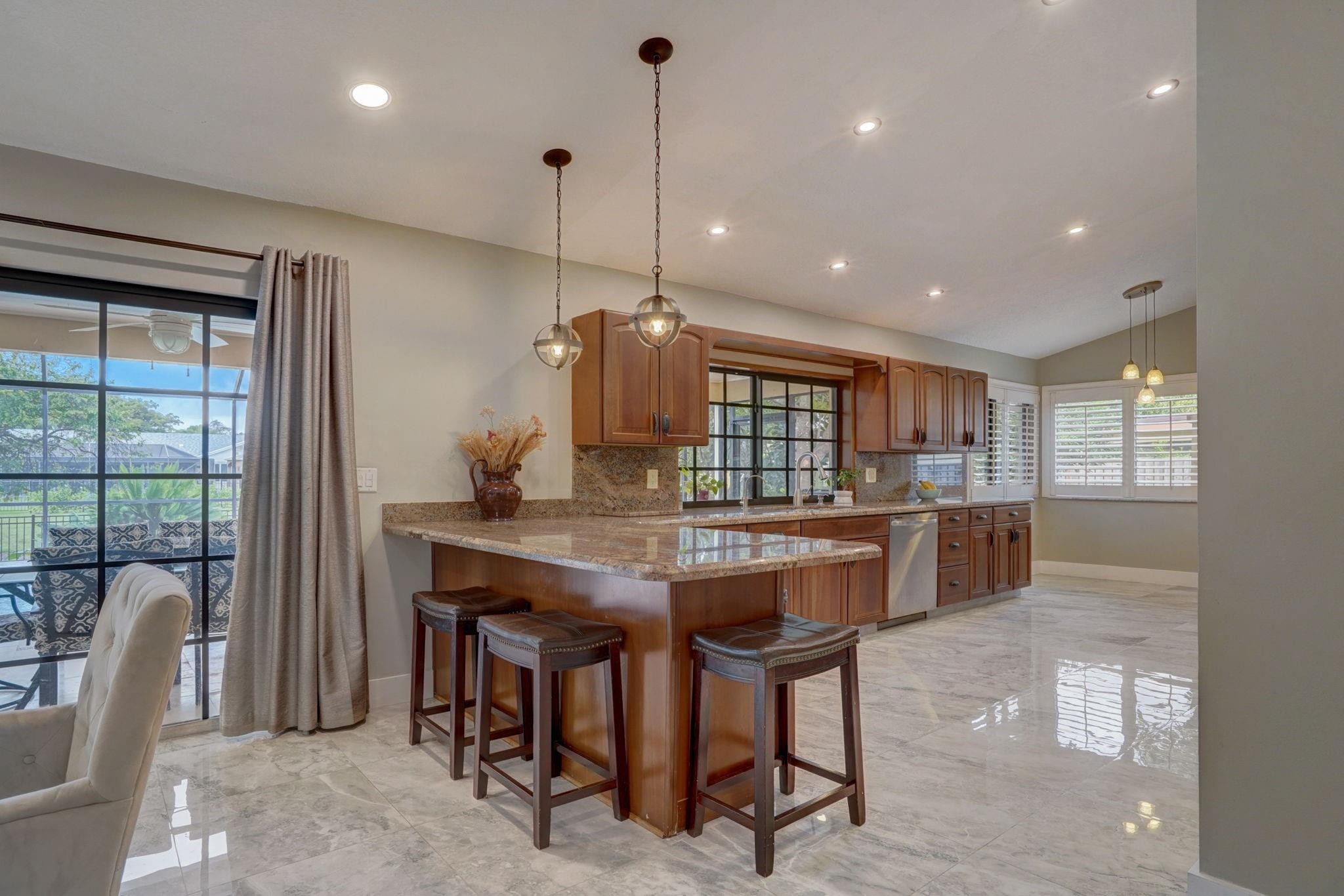 10377 185th Street South Boca Raton, FL 33498 - Photo 9 of 47 Breakfast/snack bar in the kitchen