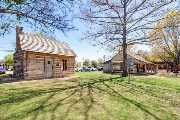 a view of a swimming pool with a deck