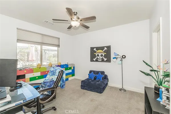 a living room with a couch and a table