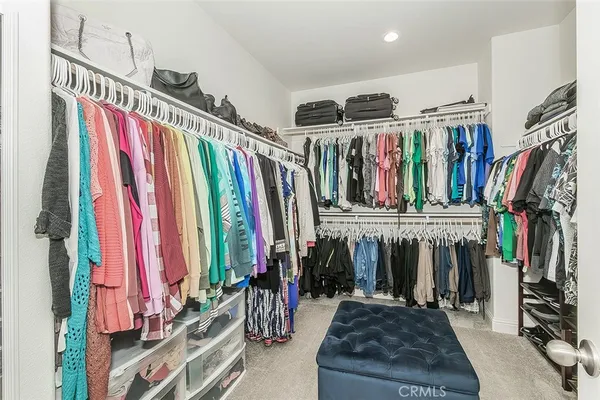a view of a patio with table and chairs and potted plants