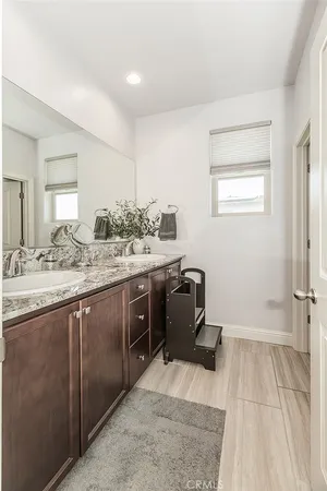 a view of a backyard with sitting area