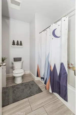 a narrow alley leading to a building