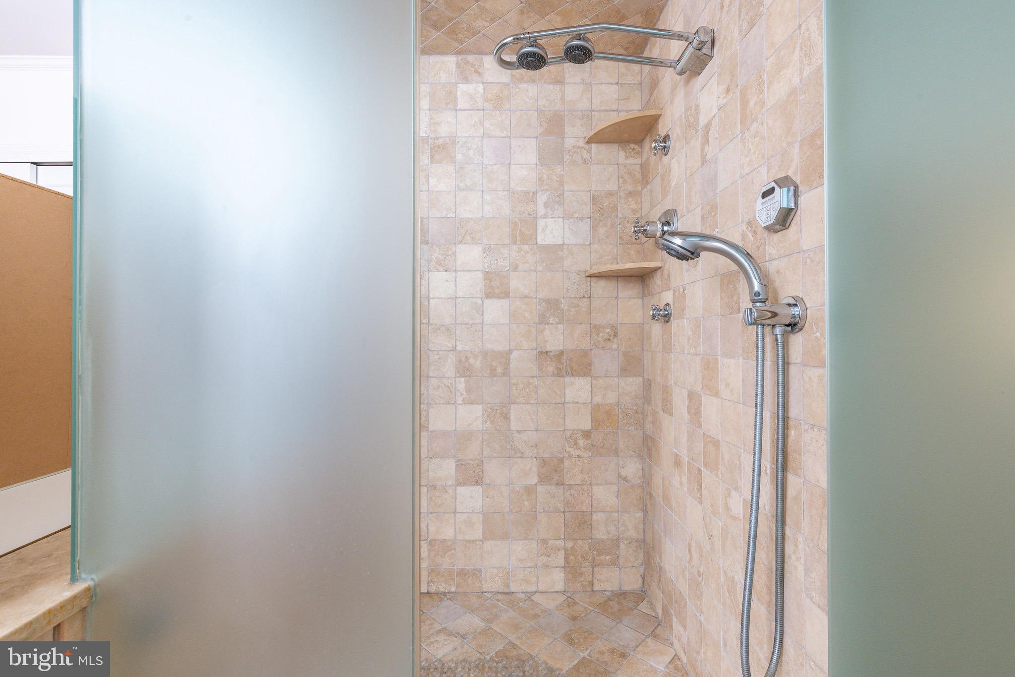 1901 Walnut Street, Unit 5E Philadelphia, PA 19103 - Photo 15 of 28 a bathroom with a shower