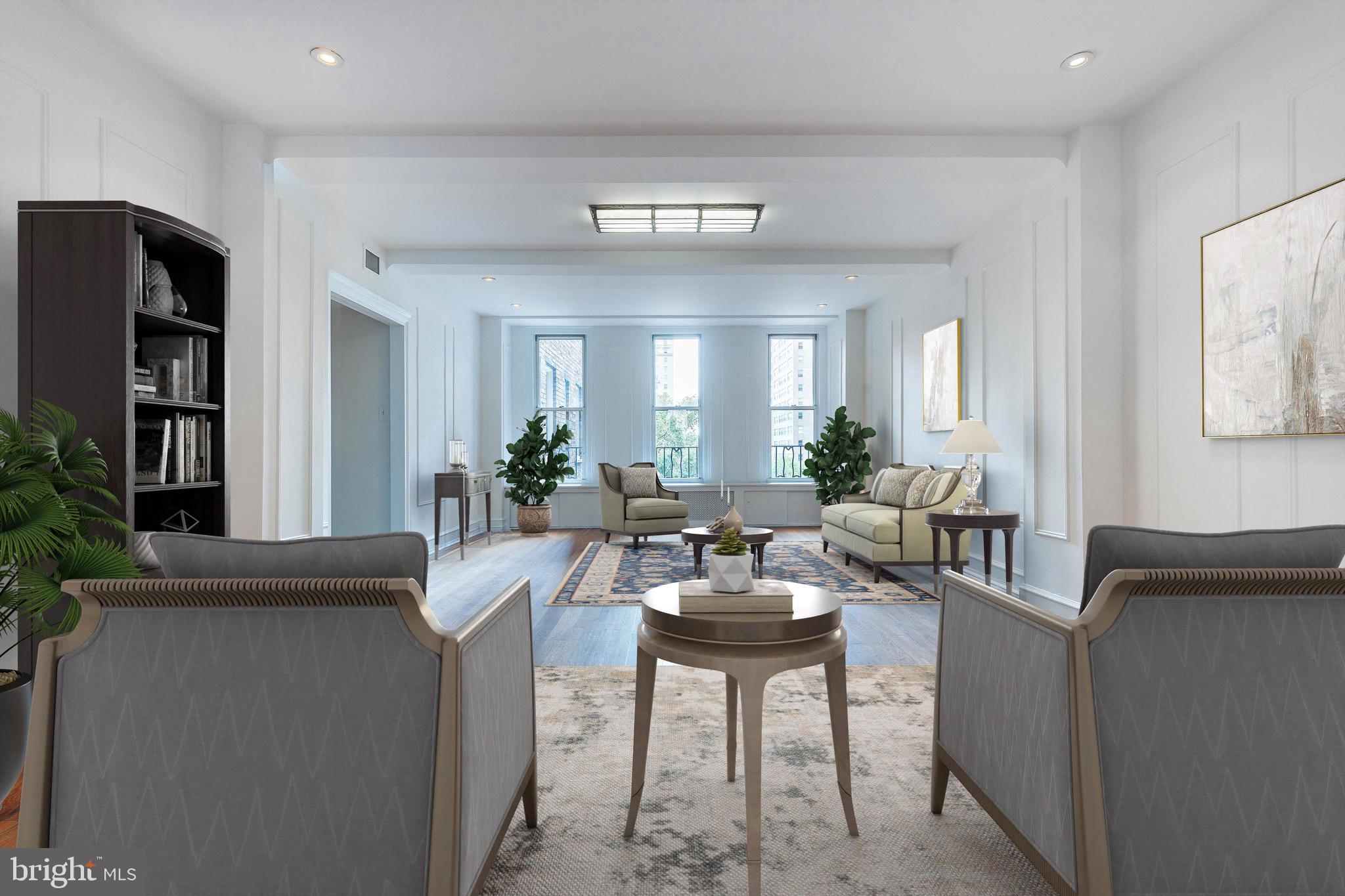 1901 Walnut Street, Unit 5E Philadelphia, PA 19103 - Photo 7 of 28 a view of a livingroom with furniture and window