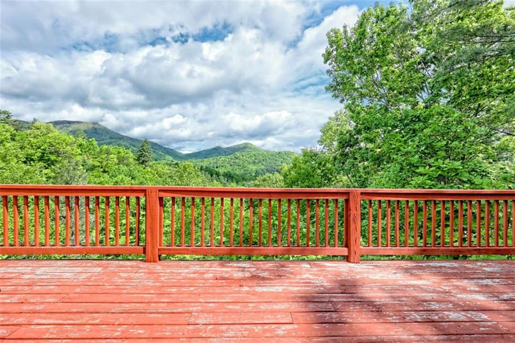 995 Glassy Mountain Road Hiawassee, GA 30546 - Photo 16 of 87 a view of balcony with wooden floor
