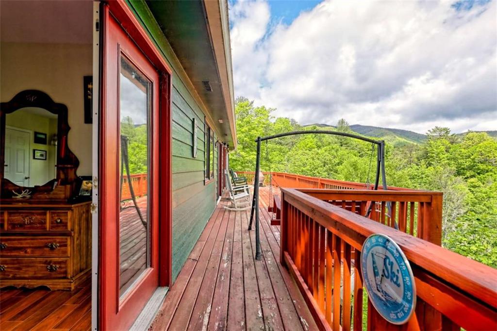 995 Glassy Mountain Road Hiawassee, GA 30546 - Photo 37 of 87 a view of balcony with wooden floor