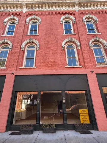 a front view of a multi story residential apartment building