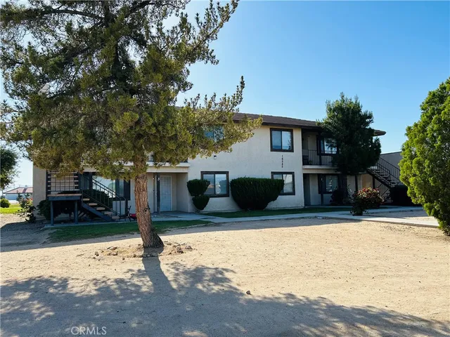 a house view with a outdoor space