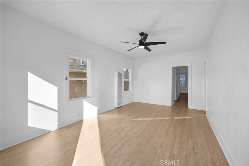 1364 Cherry Long Beach, CA 90813 - Photo 4 of 14 a view of empty room with wooden floor and fan
