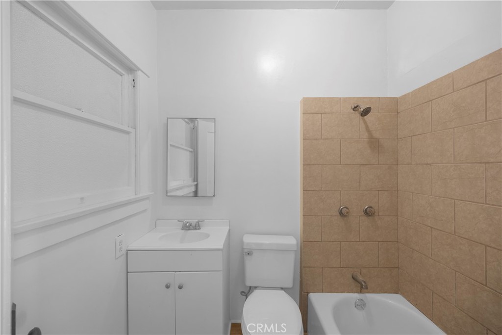 1364 Cherry Long Beach, CA 90813 - Photo 7 of 14 a bathroom with a sink toilet and shower