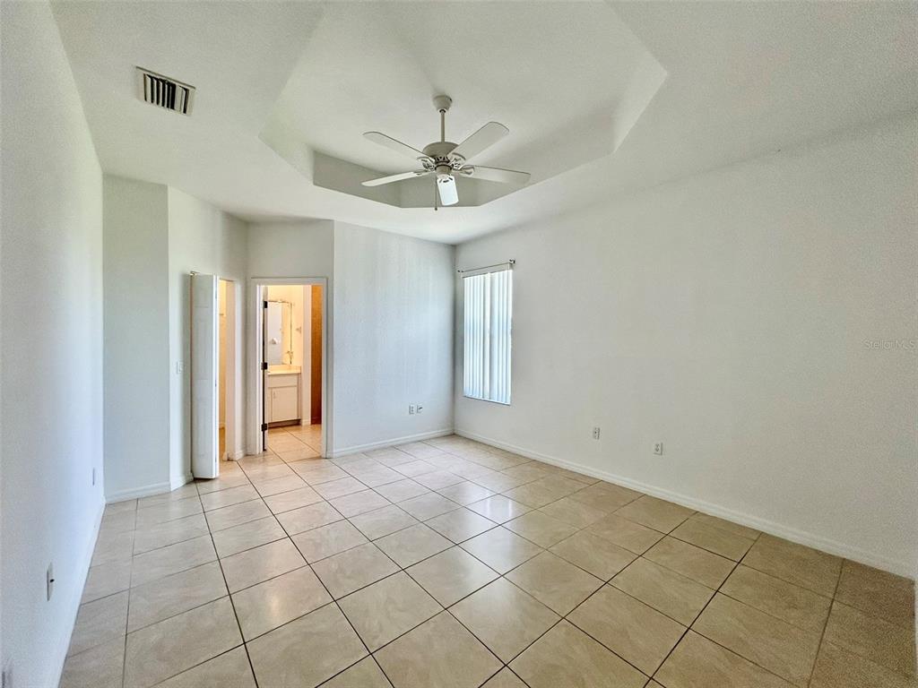 26141 Northern Cross Road Punta Gorda, FL 33983 - Photo 9 of 17 a view of an empty room with window