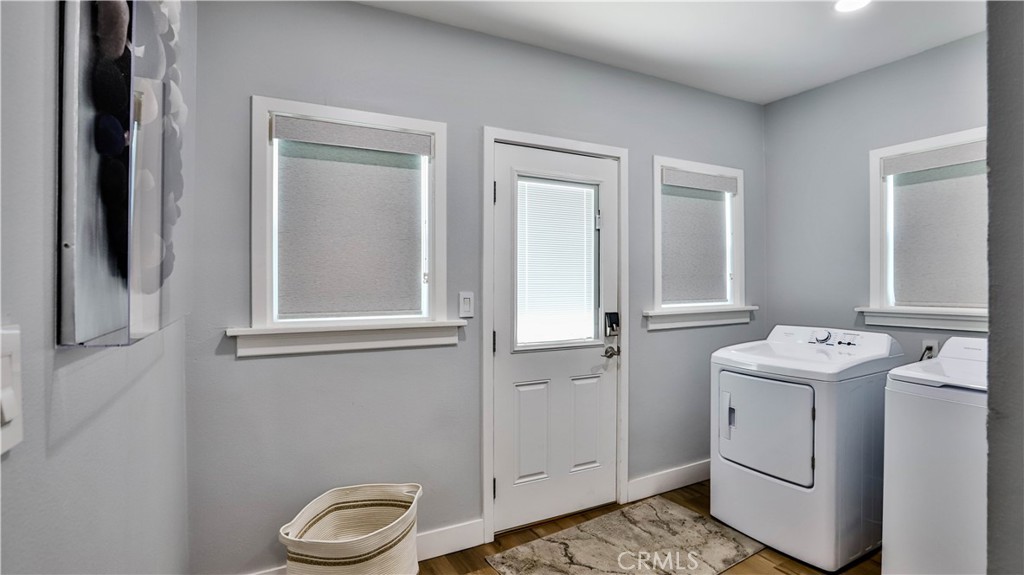 408 South Flower Street Santa Ana, CA 92703 - Photo 29 of 71 a bathroom with a toilet sink and mirror