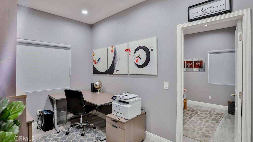 408 South Flower Street Santa Ana, CA 92703 - Photo 47 of 71 a bedroom with a table and a chair