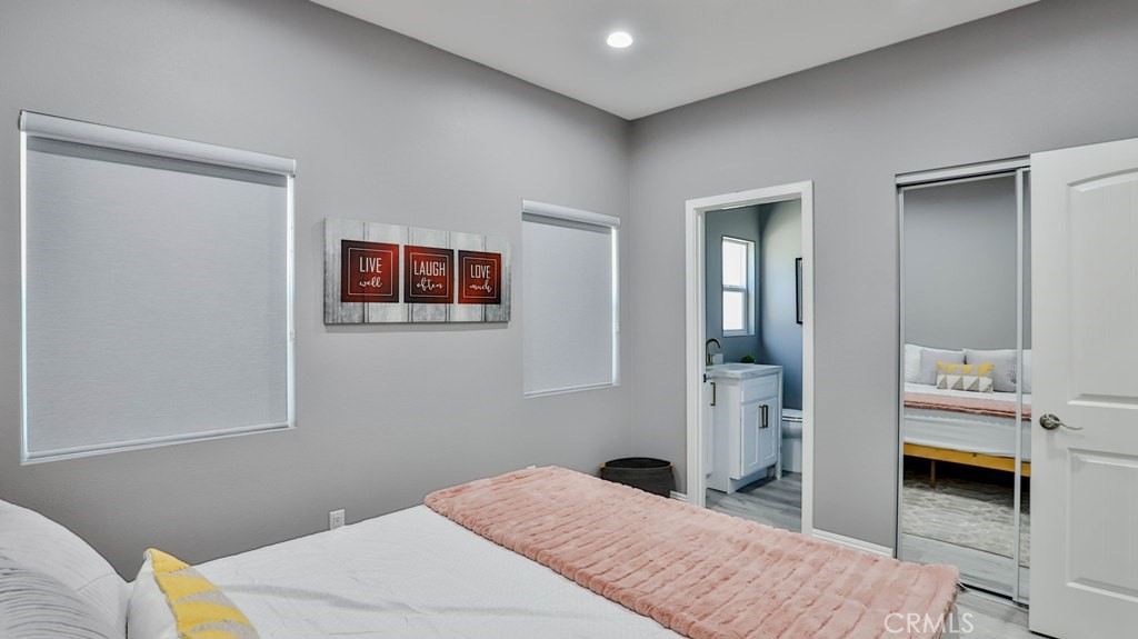 408 South Flower Street Santa Ana, CA 92703 - Photo 53 of 71 a bedroom with a bed and a view of bedroom