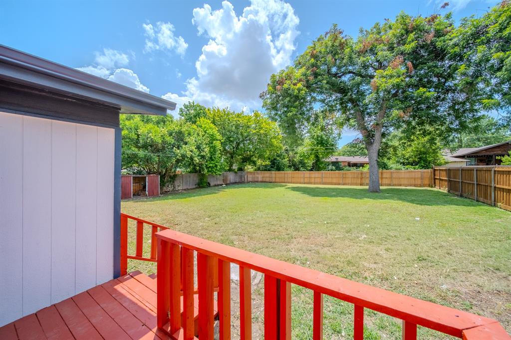 920 Treasure Road Garland, TX 75041 - Photo 15 of 19 a view of a backyard with green space