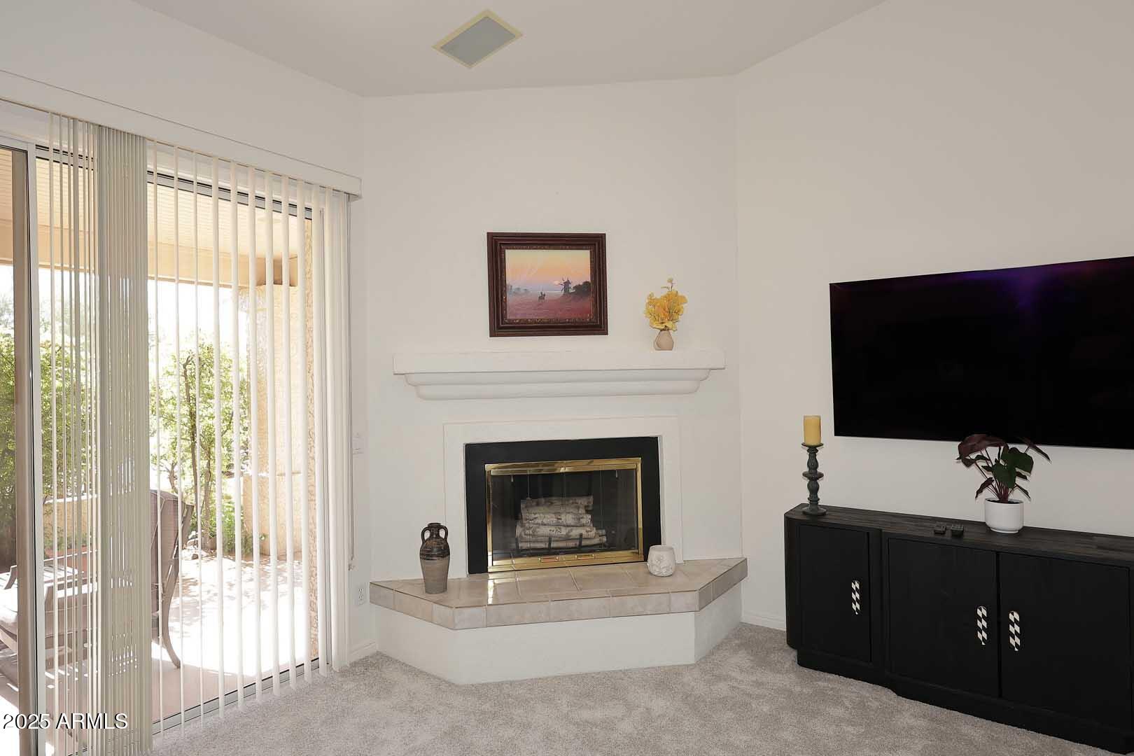 18510 East Leather Lane Rio Verde, AZ 85263 - Photo 11 of 67 a living room with furniture and a flat screen tv