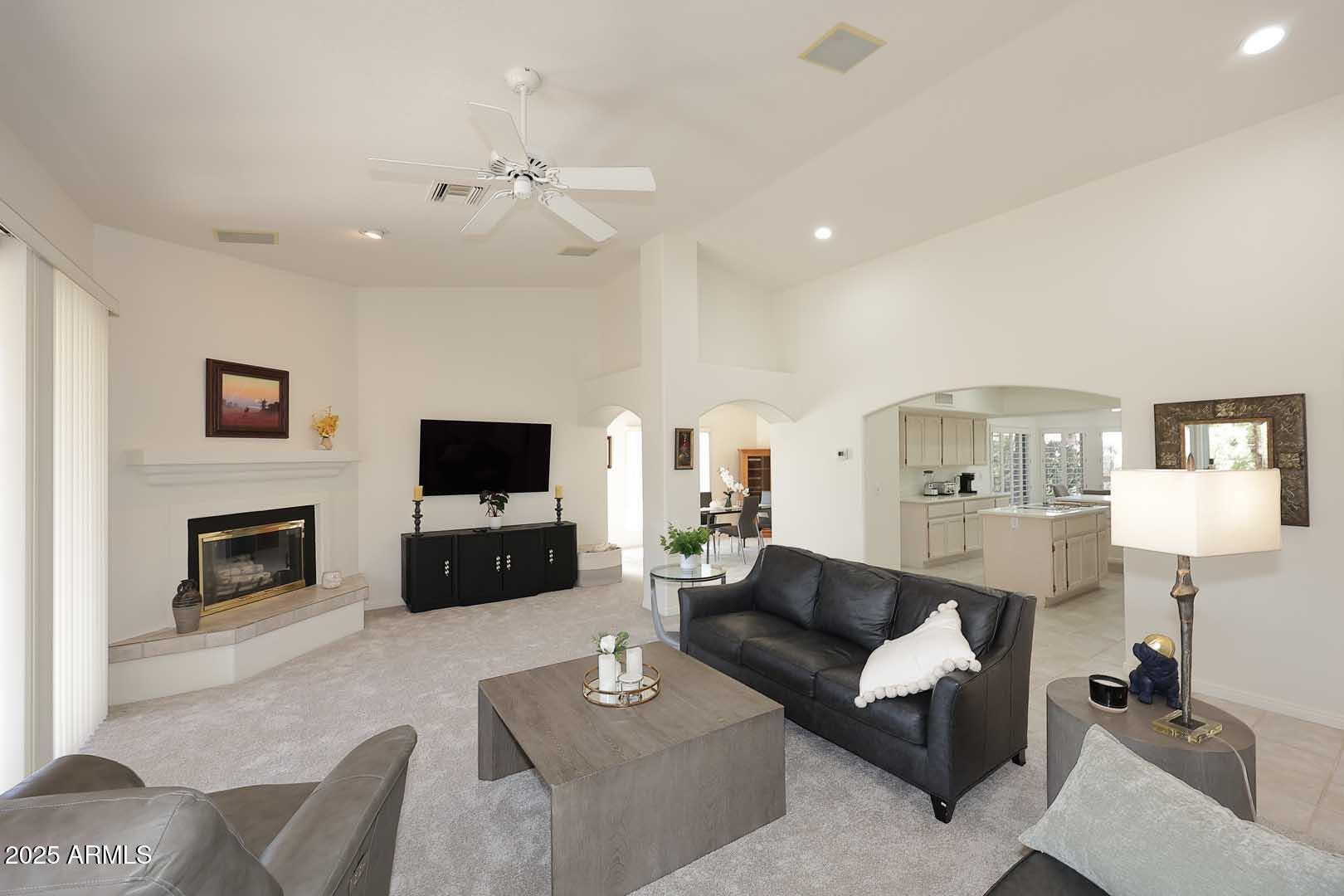 18510 East Leather Lane Rio Verde, AZ 85263 - Photo 12 of 67 a living room with furniture and a wooden floor