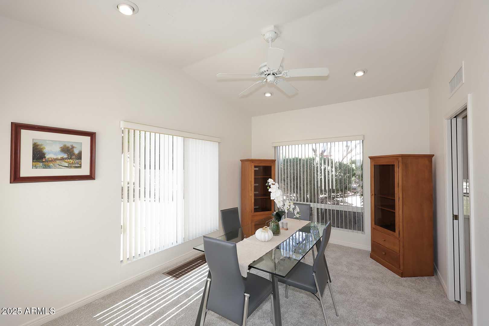 18510 East Leather Lane Rio Verde, AZ 85263 - Photo 13 of 67 a dining room with furniture and window