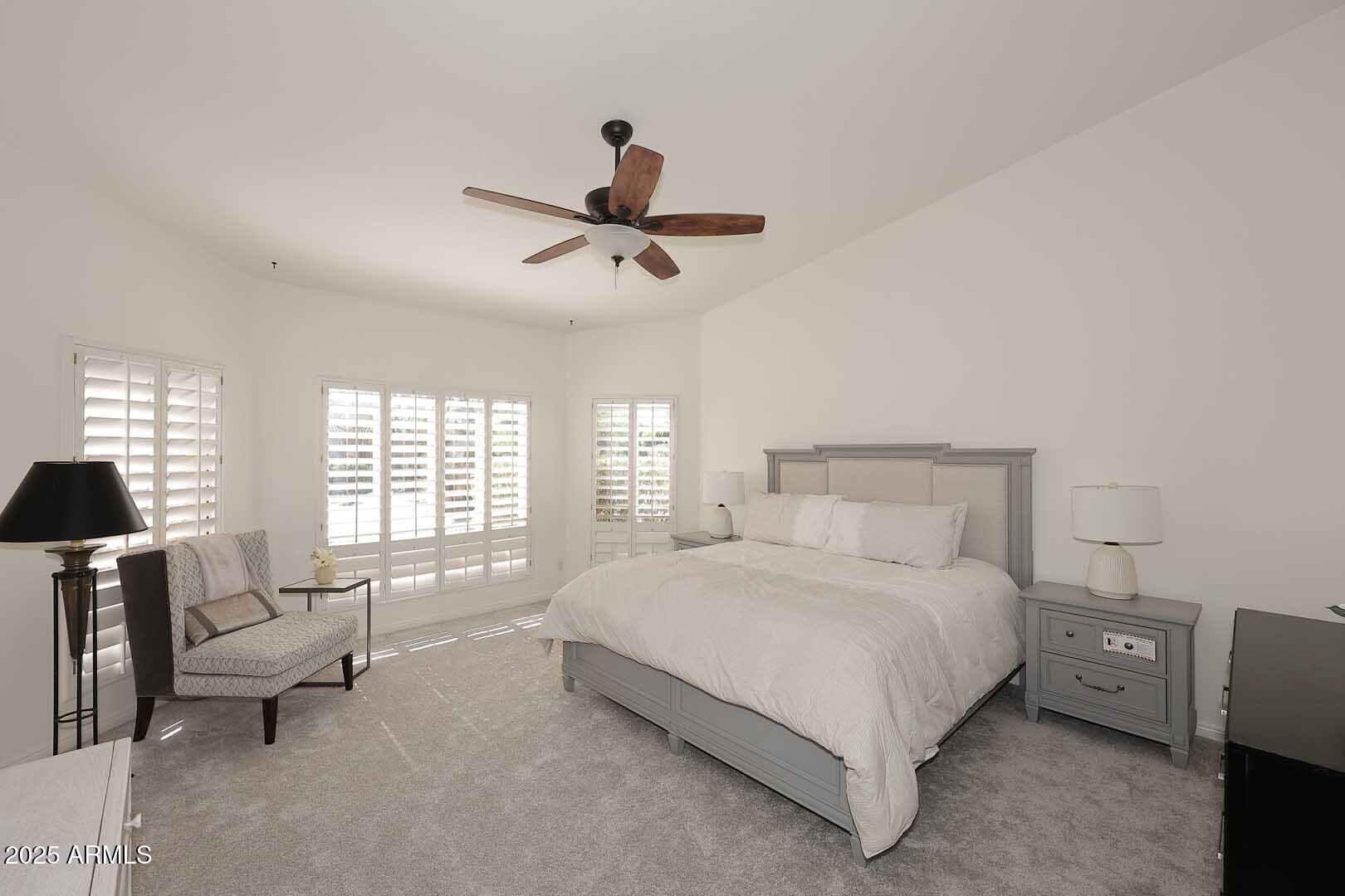 18510 East Leather Lane Rio Verde, AZ 85263 - Photo 26 of 67 a bedroom with a bed and a couch