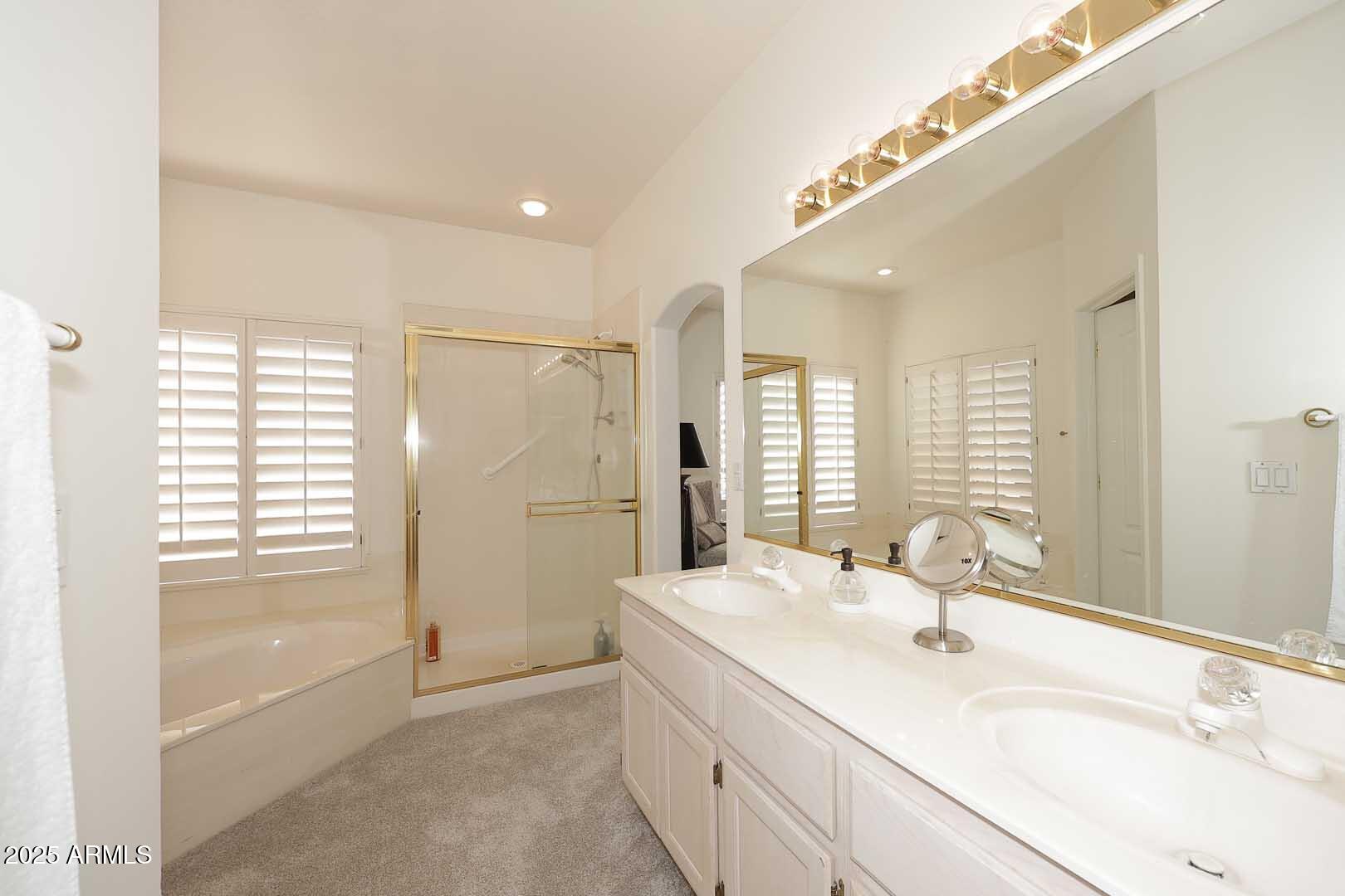18510 East Leather Lane Rio Verde, AZ 85263 - Photo 30 of 67 a bathroom with a granite countertop sink mirror and a