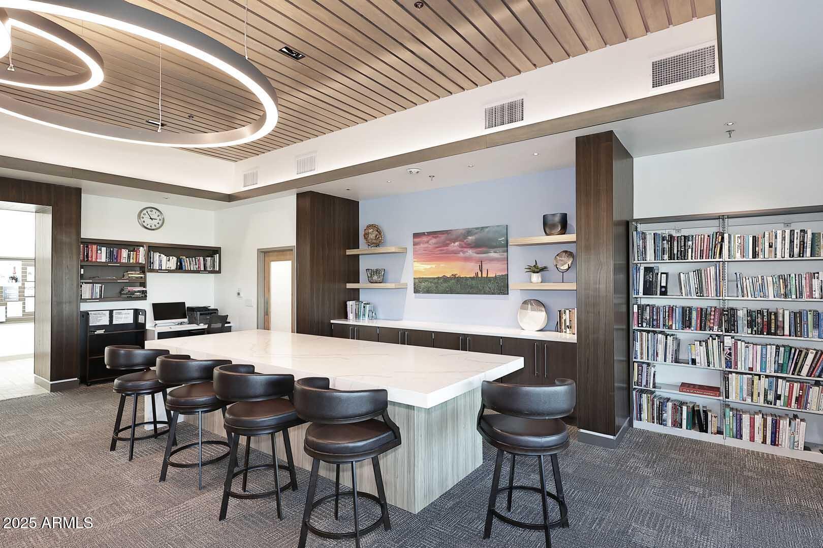 18510 East Leather Lane Rio Verde, AZ 85263 - Photo 52 of 67 a room with furniture and book shelf