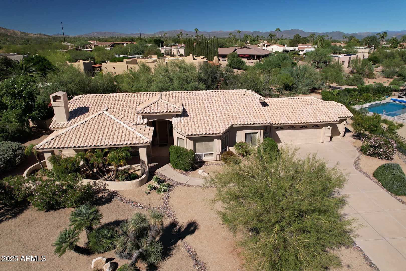 18510 East Leather Lane Rio Verde, AZ 85263 - Photo 59 of 67 an aerial view of a house with a yard basket ball court and outdoor seating