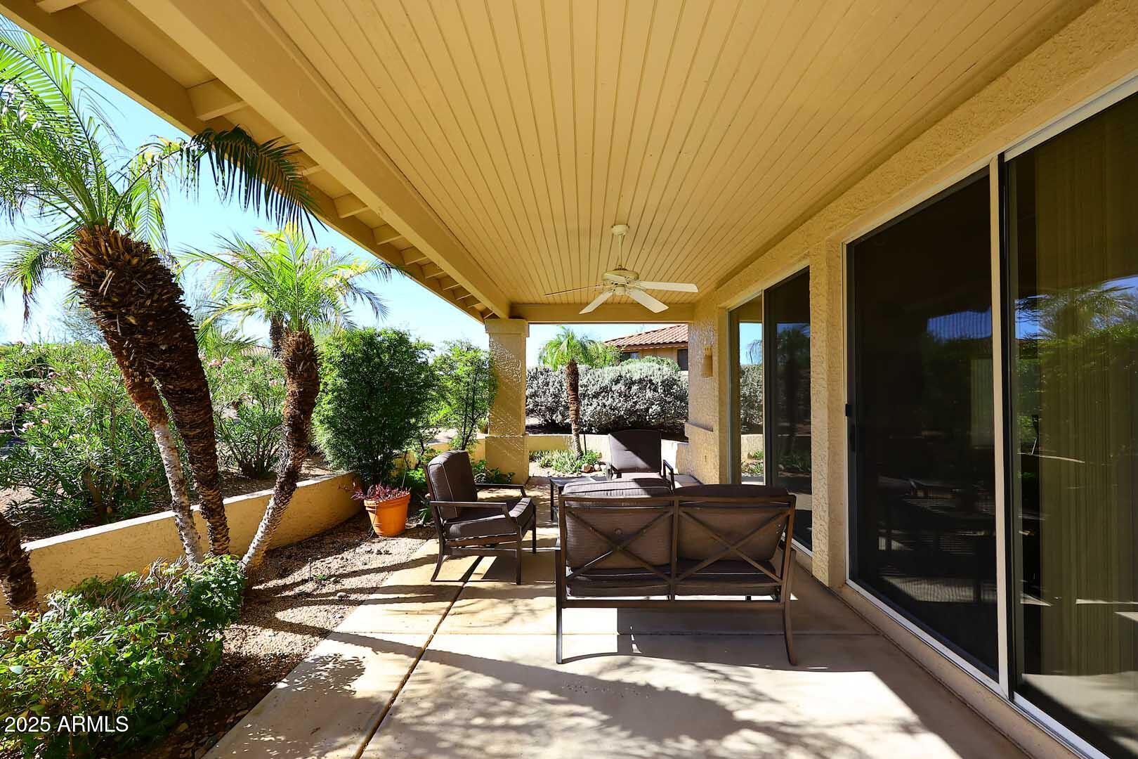 18510 East Leather Lane Rio Verde, AZ 85263 - Photo 6 of 67 a building outdoor space with patio furniture and potted plants