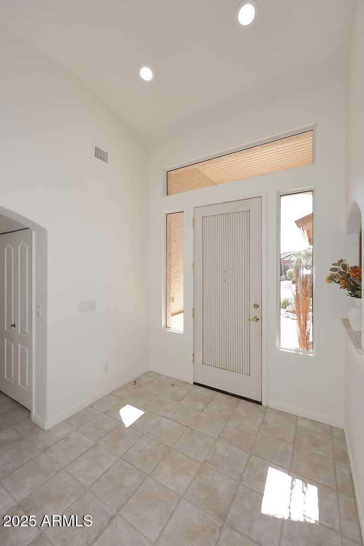 18510 East Leather Lane Rio Verde, AZ 85263 - Photo 8 of 67 an empty room with windows and closet
