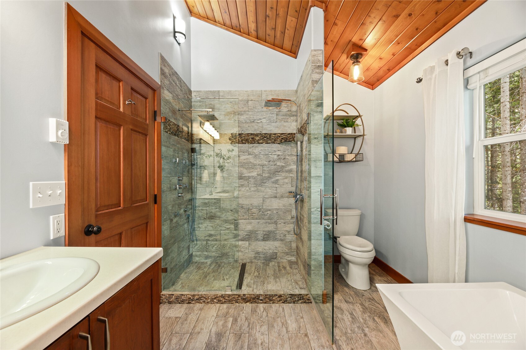 91 Mountain Home Road Snoqualmie Pass, WA 98068 - Photo 17 of 34 a bathroom with a sink a toilet and shower